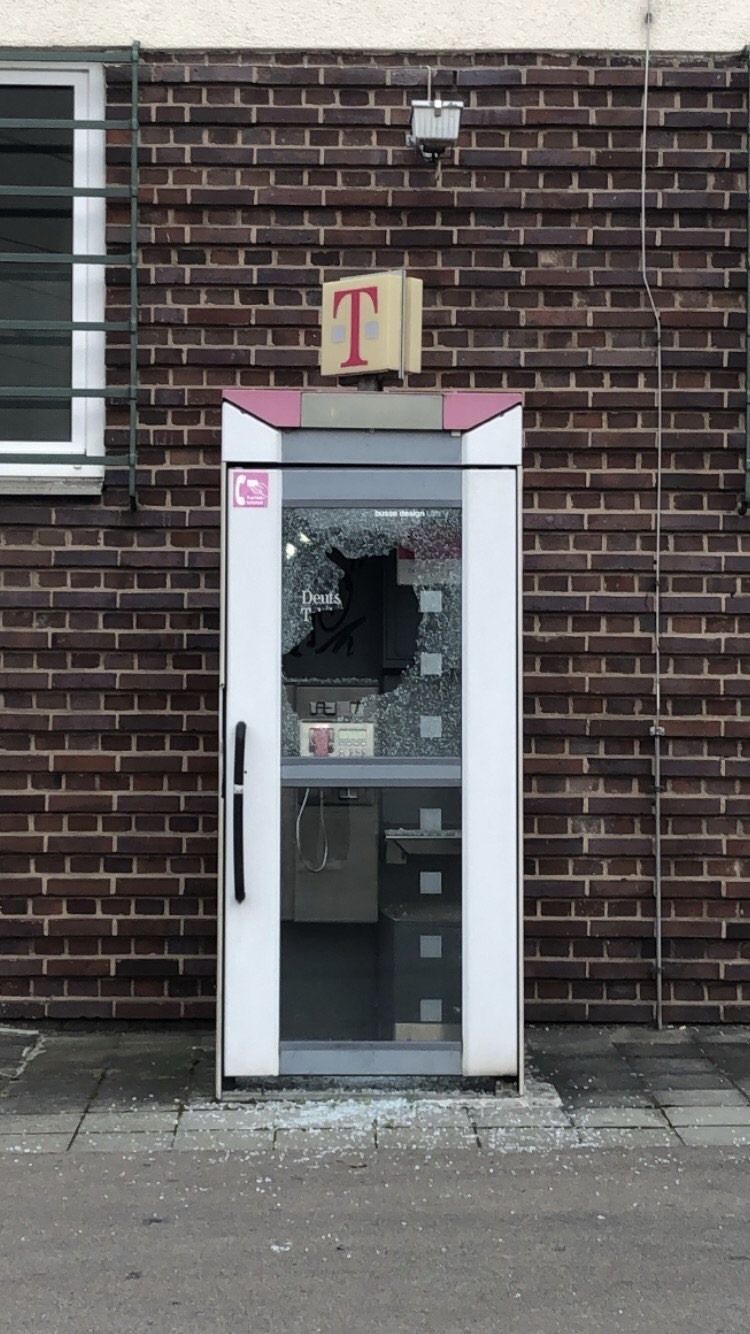 broken telephone booth